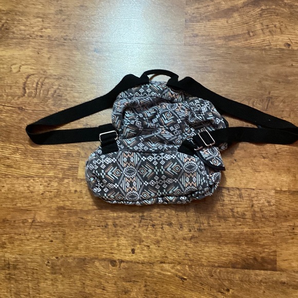 No Boundaries Printed Canvas Buckle Flap Backpack - Picture 11 of 11